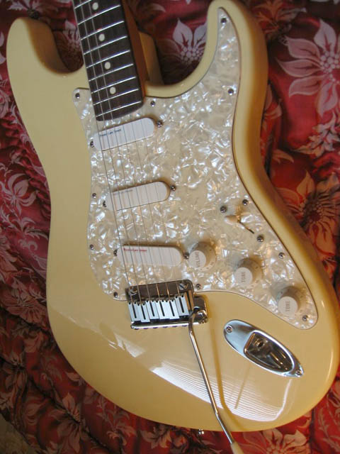 http://xhefriguitars.com/Stuff/Plus%20Colors/Aged%20Vintage%20White.jpg